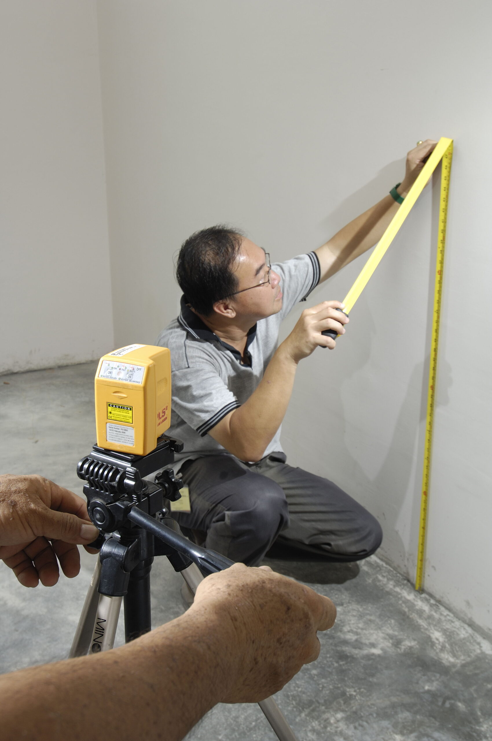 Step 1 – Surface Preparation: checking sub-floor surface level