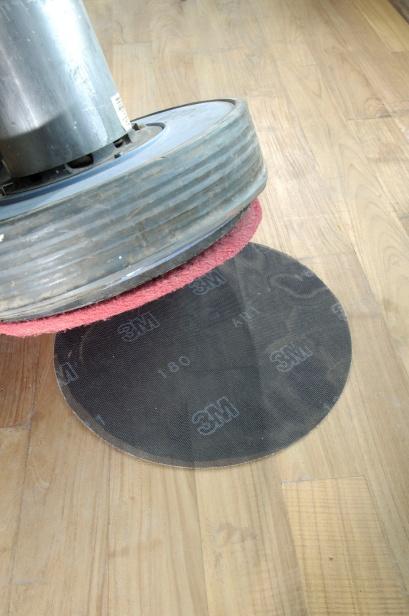 Step 3 – Sanding & Varnishing: removing grain-raising using the SCAD wing buffing machine